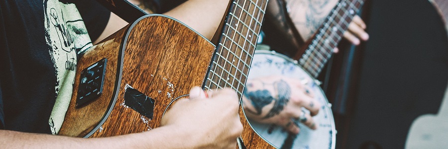 Two guitarists playing music